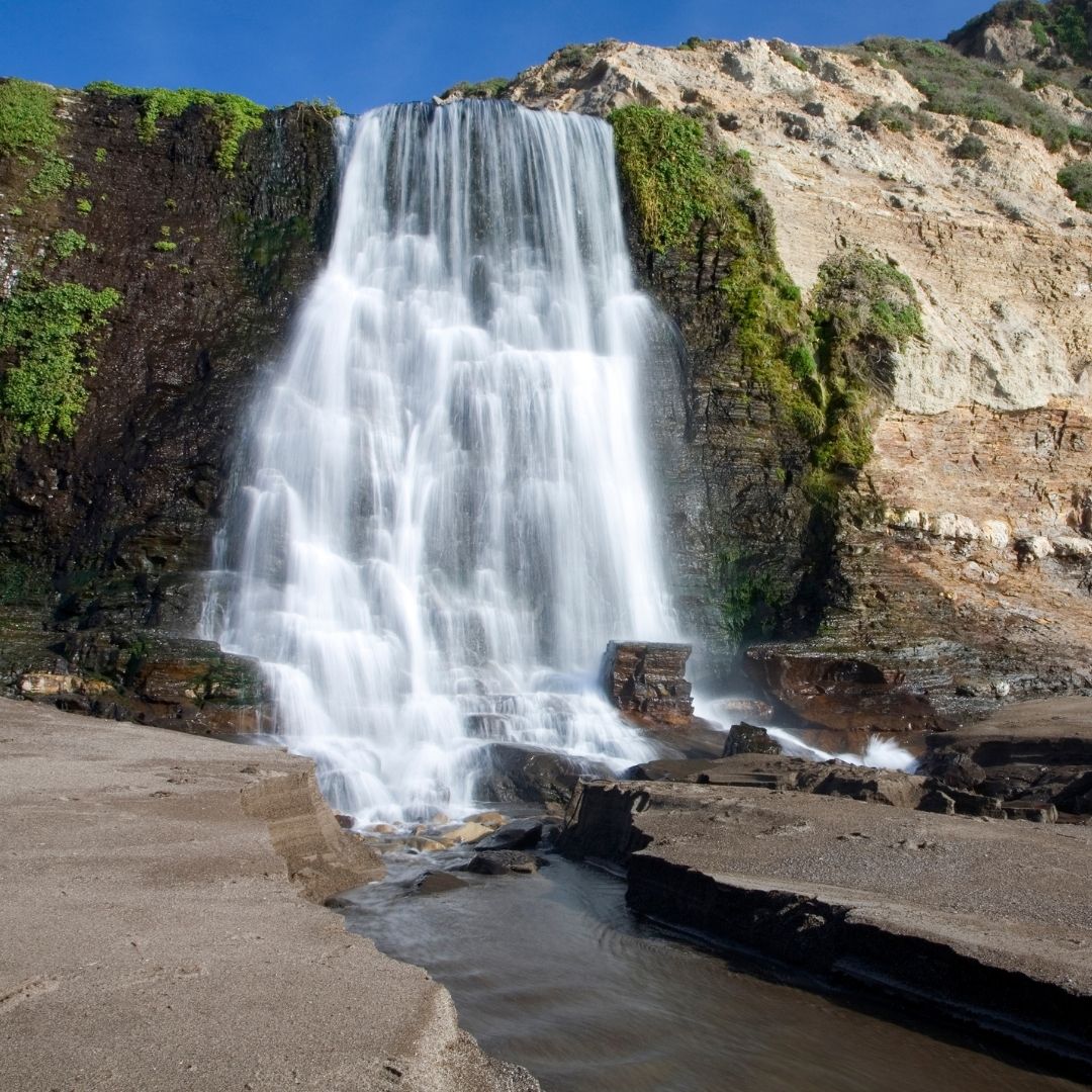 Alamere Falls waterfall on beach 01